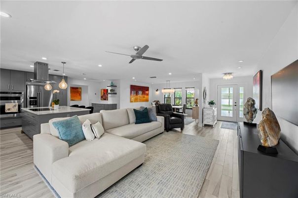 Dining room, Interior, Kitchen, Living room, Pendant Lights, Recessed Lighting, Stainless Steel Appliances, Wood Texture Flooring