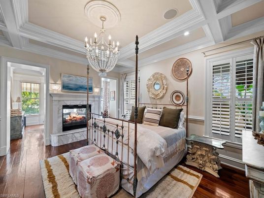 Bedroom, Chandelier, Fireplace, Interior, Recessed Lighting, Wood Texture Flooring