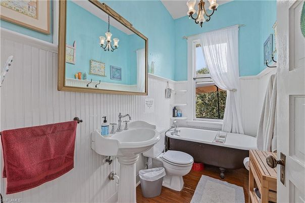 Bathroom, Chandelier, Free Standing Baths, Interior, Wood Texture Flooring