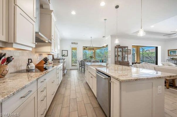 Dining room, Interior, Kitchen, Living room, Pendant Lights, Recessed Lighting, Stainless Steel Appliances, Wood Texture Flooring