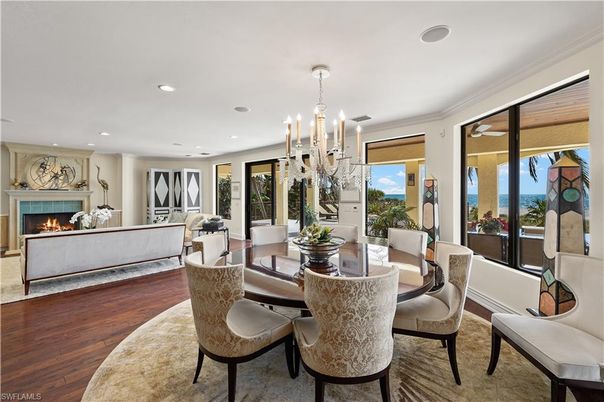 Dining room, Fireplace, Interior, Living room, Pendant Lights, Recessed Lighting, Wood Texture Flooring
