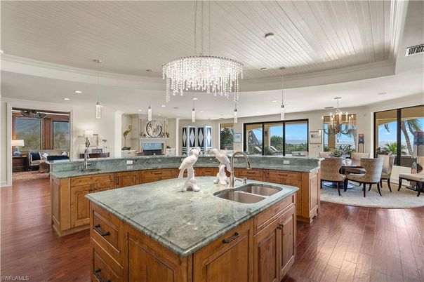Chandelier, Dining room, Fireplace, Interior, Kitchen, Living room, Pendant Lights, Recessed Lighting, Wood Texture Flooring