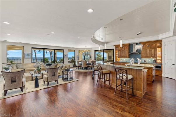 Chandelier, Dining room, Interior, Kitchen, Living room, Pendant Lights, Recessed Lighting, Wood Texture Flooring