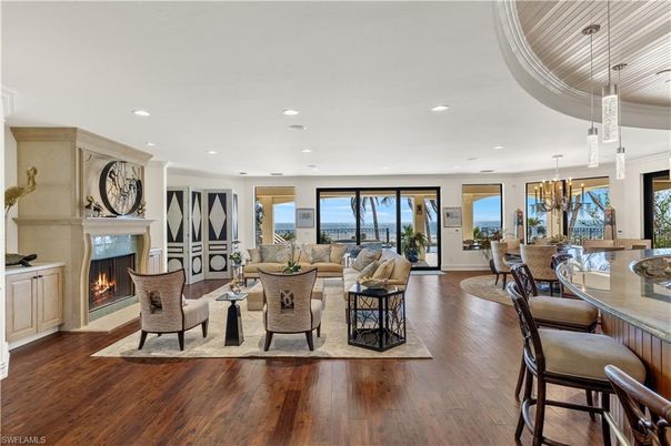 Chandelier, Dining room, Fireplace, Interior, Living room, Recessed Lighting, Wood Texture Flooring