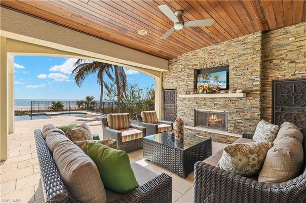 Exterior, Fireplace, Living room, Stone Walls, Water, Wooden Ceilings