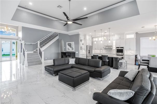 Chandelier, Dining room, Interior, Kitchen, Living room, Marble, Pendant Lights, Recessed Lighting, Stainless Steel Appliances