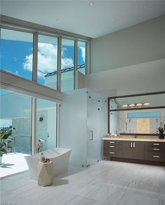 Bathroom, Free Standing Baths, Glass Shower, Interior, Recessed Lighting, Wood Texture Flooring