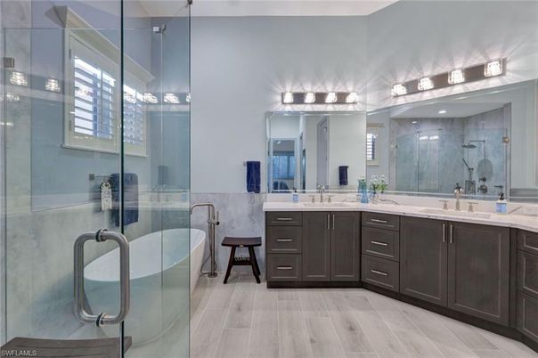 Bathroom, Dual Sink Vanities, Free Standing Baths, Glass Shower, Interior, Wood Texture Flooring