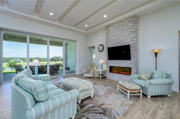 Fireplace, Interior, Living room, Recessed Lighting, Stone Walls, Wood Texture Flooring
