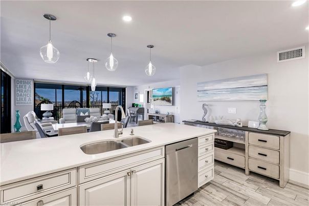 Dining room, Interior, Kitchen, Living room, Pendant Lights, Recessed Lighting, Stainless Steel Appliances, Wood Texture Flooring