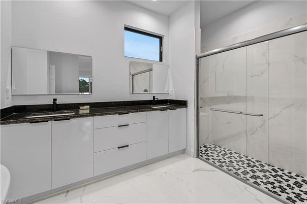Bathroom, Dual Sink Vanities, Glass Shower, Interior, Marble, Marble Walls