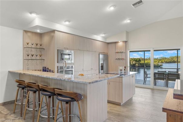 Interior, Kitchen, Recessed Lighting, Stainless Steel Appliances, Water, Wood Texture Flooring