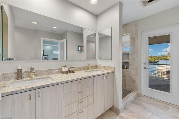 Bathroom, Dual Sink Vanities, Interior, Recessed Lighting, Wood Texture Flooring