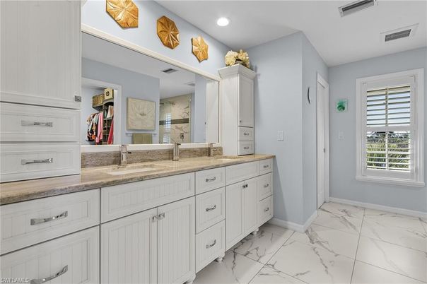 Bathroom, Dual Sink Vanities, Interior, Marble, Marble Walls, Recessed Lighting