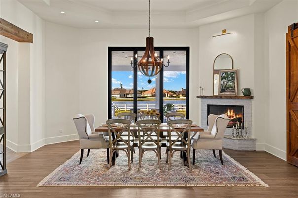 Chandelier, Dining room, Fireplace, Interior, Recessed Lighting, Wood Texture Flooring