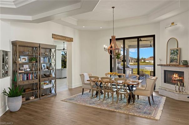 Chandelier, Dining room, Fireplace, Interior, Pendant Lights, Recessed Lighting, Wood Texture Flooring