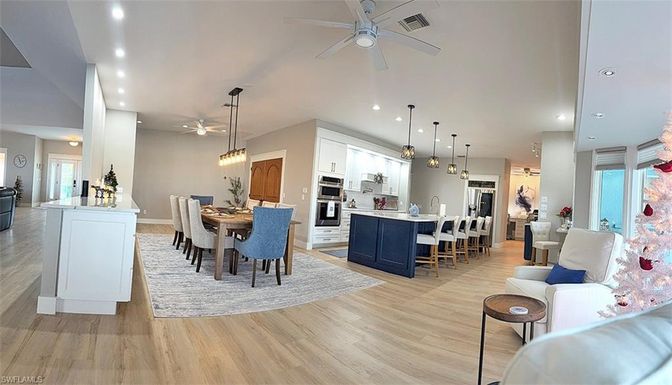 Dining room, Interior, Kitchen, Pendant Lights, Recessed Lighting, Stainless Steel Appliances, Wood Texture Flooring