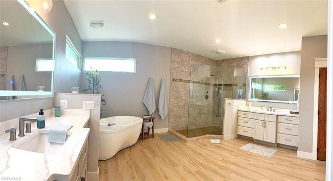 Bathroom, Free Standing Baths, Glass Shower, Interior, Recessed Lighting, Wood Texture Flooring
