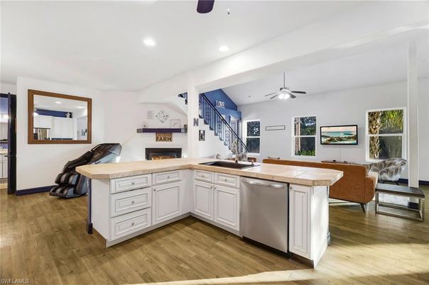 Fireplace, Interior, Kitchen, Living room, Recessed Lighting, Wood Texture Flooring