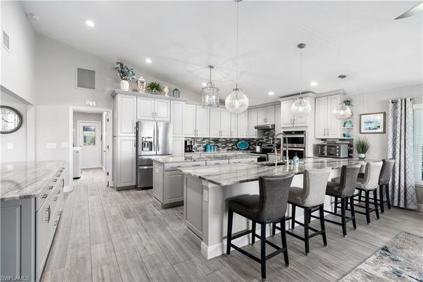 Interior, Kitchen, Pendant Lights, Recessed Lighting, Stainless Steel Appliances, Wood Texture Flooring
