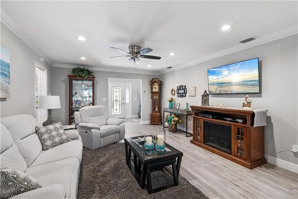Fireplace, Interior, Living room, Recessed Lighting, Wood Texture Flooring