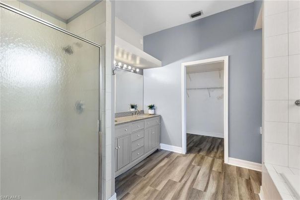 Bathroom, Glass Shower, Interior, Walk-in Closets, Wood Texture Flooring