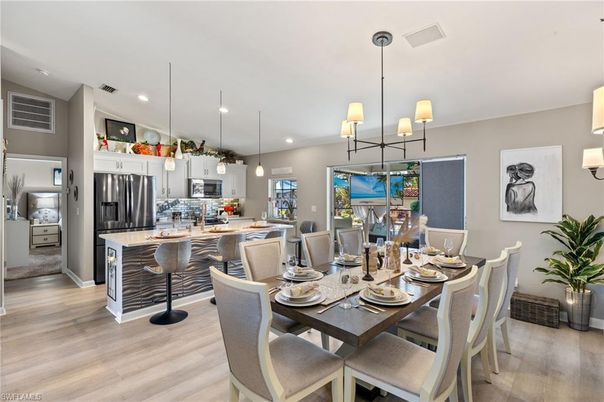 Dining room, Interior, Kitchen, Pendant Lights, Recessed Lighting, Stainless Steel Appliances, Wood Texture Flooring