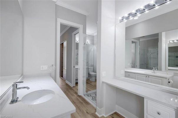 Bathroom, Dual Sink Vanities, Glass Shower, Interior, Wood Texture Flooring