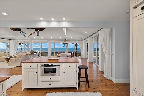 Chandelier, Dining room, Interior, Kitchen, Living room, Recessed Lighting, Wood Texture Flooring