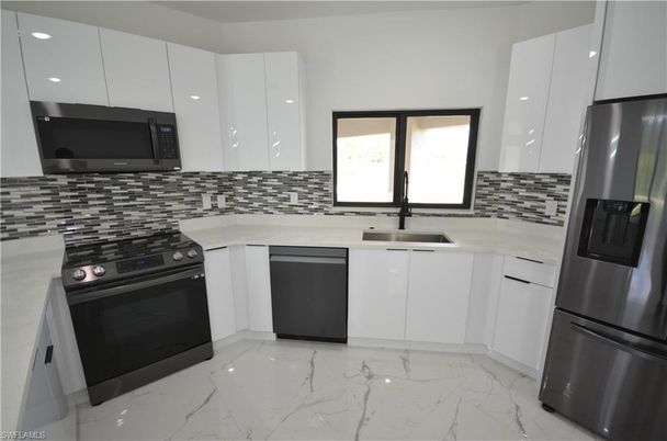 Interior, Kitchen, Marble, Recessed Lighting, Stainless Steel Appliances