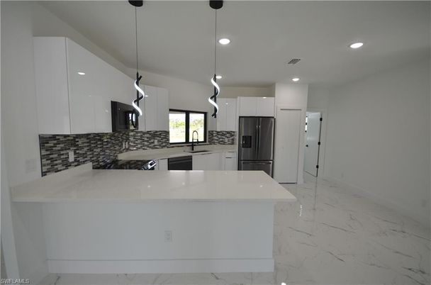 Interior, Kitchen, Marble, Pendant Lights, Recessed Lighting, Stainless Steel Appliances