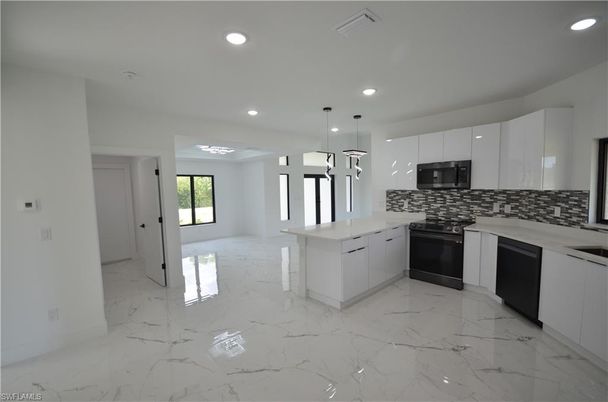 Interior, Kitchen, Marble, Pendant Lights, Recessed Lighting, Stainless Steel Appliances