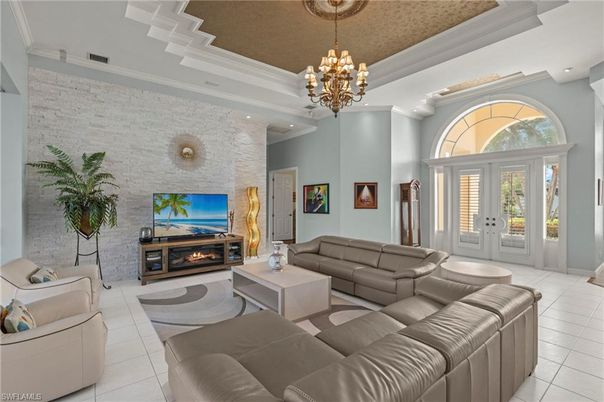 Chandelier, Fireplace, Interior, Living room, Recessed Lighting, Stone Walls