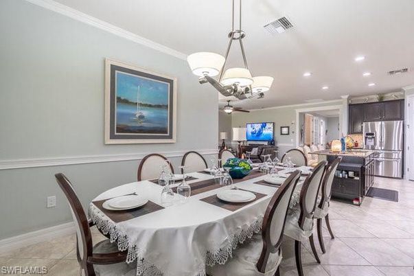 Chandelier, Dining room, Interior, Kitchen, Pendant Lights, Recessed Lighting, Stainless Steel Appliances