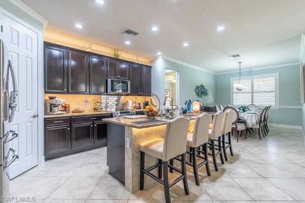 Chandelier, Dining room, Interior, Kitchen, Recessed Lighting, Stainless Steel Appliances