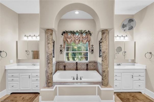 Bathroom, Dual Sink Vanities, Interior, Recessed Lighting, Wood Texture Flooring