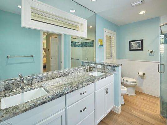 Bathroom, Dual Sink Vanities, Glass Shower, Interior, Recessed Lighting, Wood Texture Flooring