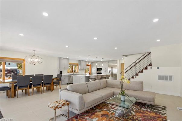 Chandelier, Dining room, Interior, Kitchen, Living room, Pendant Lights, Recessed Lighting, Stainless Steel Appliances