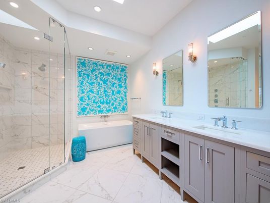 Bathroom, Dual Sink Vanities, Glass Shower, Interior, Marble, Marble Walls, Recessed Lighting