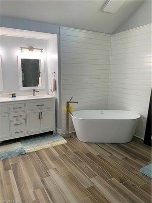 Bathroom, Dual Sink Vanities, Free Standing Baths, Interior, Wood Texture Flooring