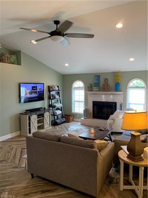 Fireplace, Interior, Living room, Recessed Lighting, Wood Texture Flooring