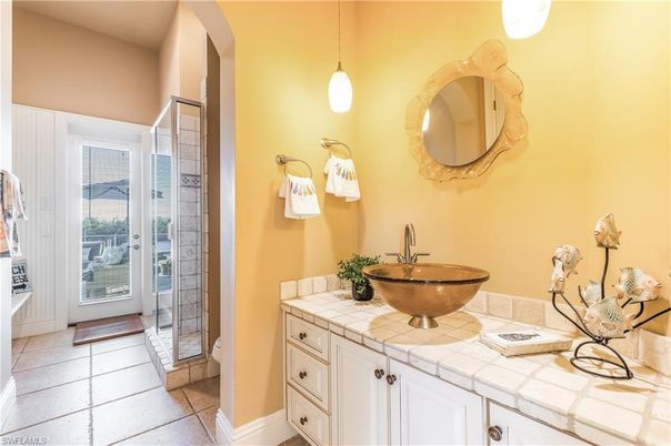 Bathroom, Dual Sink Vanities, Interior, Pendant Lights, Tile Countertops