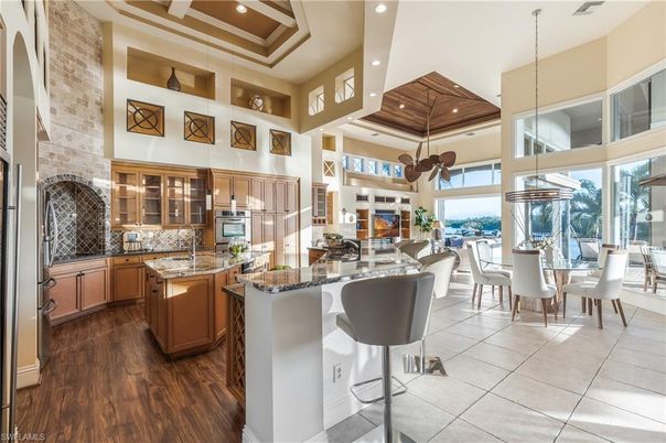 Dining room, Interior, Kitchen, Pendant Lights, Recessed Lighting, Stainless Steel Appliances, Stone Walls, Wooden Ceilings, Wood Texture Flooring