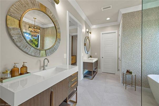 Bathroom, Chandelier, Dual Sink Vanities, Free Standing Baths, Interior, Recessed Lighting