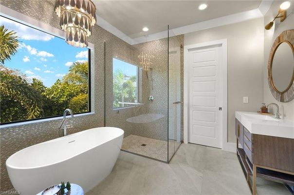 Bathroom, Chandelier, Dual Sink Vanities, Free Standing Baths, Glass Shower, Interior, Marble, Recessed Lighting
