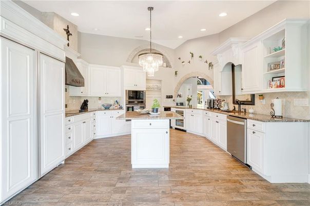 Chandelier, Interior, Kitchen, Recessed Lighting, Stainless Steel Appliances, Wood Texture Flooring