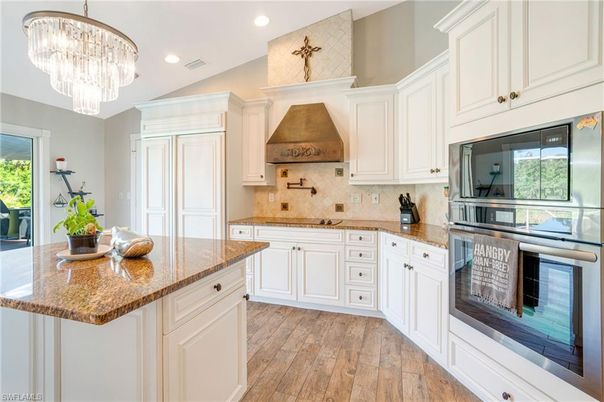 Chandelier, Interior, Kitchen, Recessed Lighting, Stainless Steel Appliances, Wood Texture Flooring