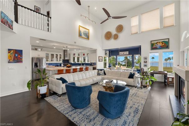 Fireplace, Interior, Kitchen, Living room, Pendant Lights, Recessed Lighting, Water, Wood Texture Flooring