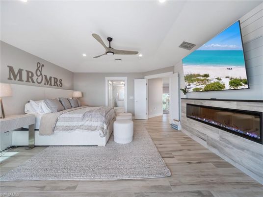 Bedroom, Fireplace, Interior, Recessed Lighting, Wood Texture Flooring