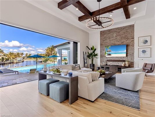 Interior, Living room, Pendant Lights, Recessed Lighting, Stone Walls, Water, Wooden Beams, Wood Texture Flooring